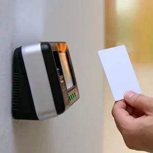 office-man-using-id-card-scan-access-control provided by alliance security in canada